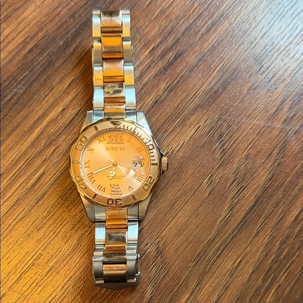 Invicta Rose Gold and Silver Men's/Womens Watch.  Will need new battery.